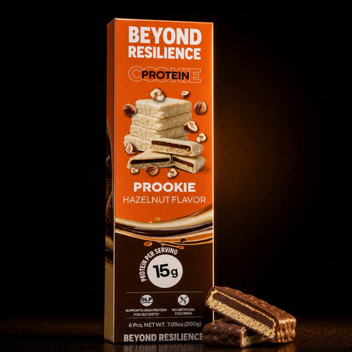 Beyond Resilience Prookie hazelnut retail carton standing upright with two cookie bars broken open beside it